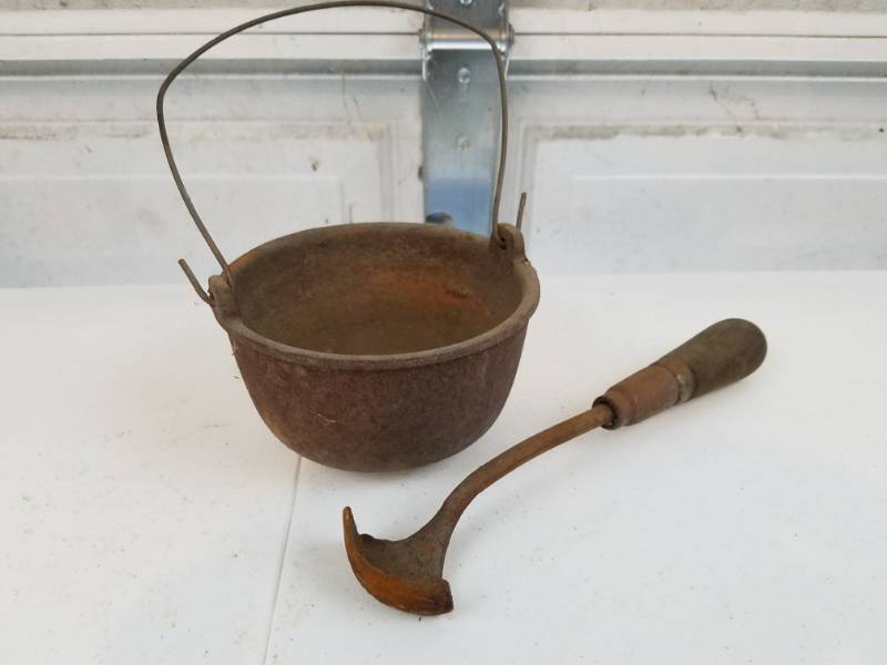 lot 91 image: Cast iron smelting pot and ladle