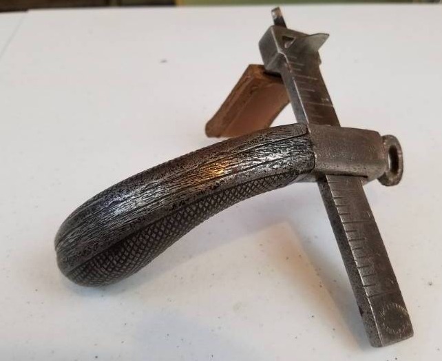 lot 114 image: Adjustable Metal Leather knife by HF Osborne