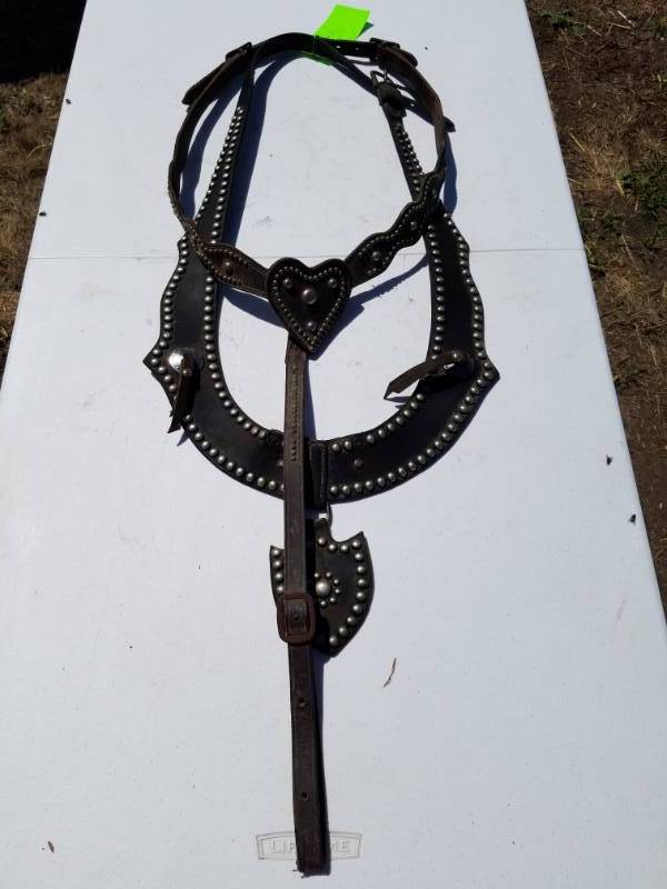 lot 140 image: Leather Spotted Breast Harness lock up for a horse