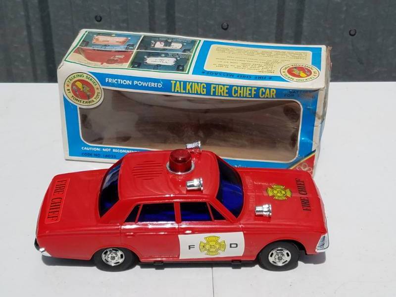 lot 184 image: Friction Powered Talking Fire Chief Car