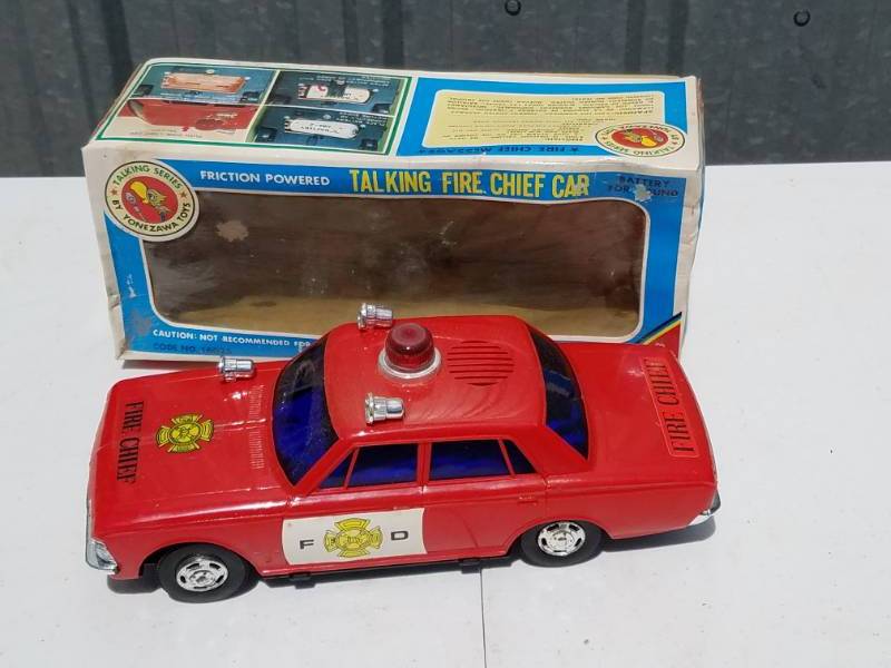 lot 185 image: Friction Powered Talking Fire Chief Car
