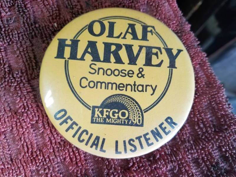 lot 251 image: Vintage Olaf Harvey KFGO Button