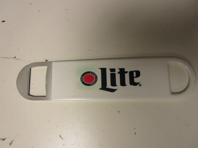 lot 136 image: LONG HANDLED BOTTLE CAP OPENERS
