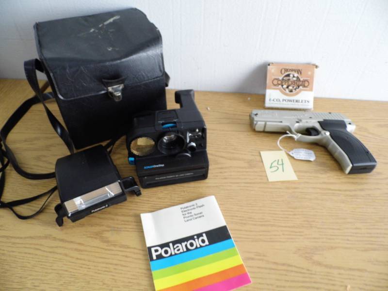 lot 54 image: Polaroid Camera - CO2 Pistol