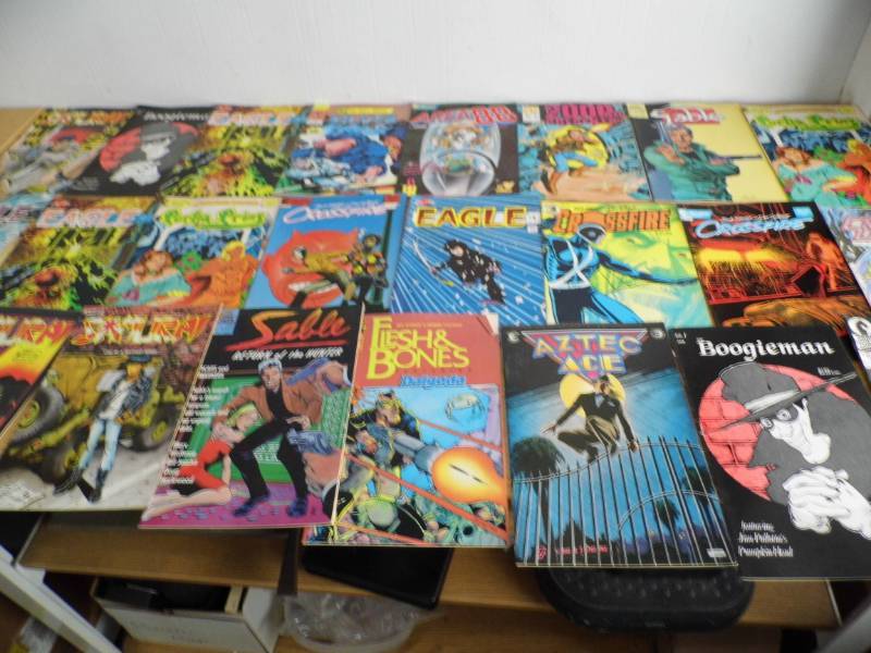 lot 103 image: Lot of Comics