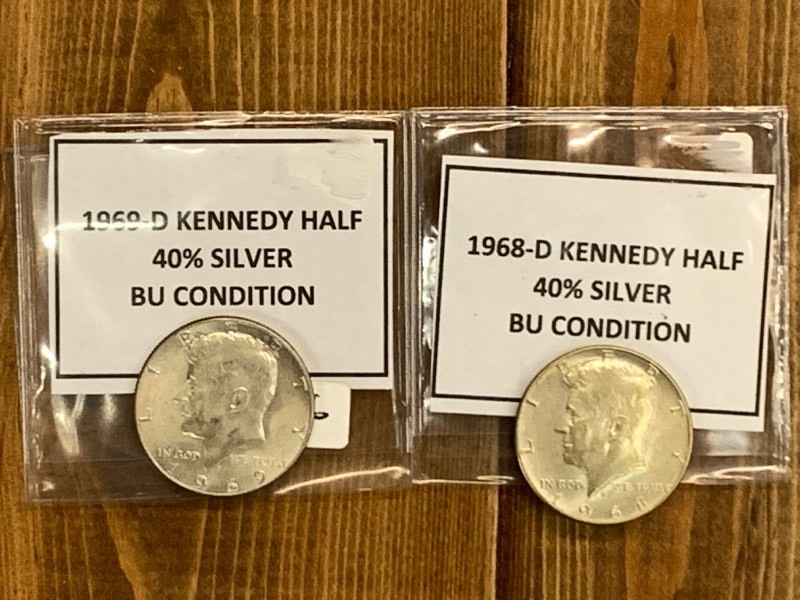 lot 56 image: (2) Kennedy Half Dollars