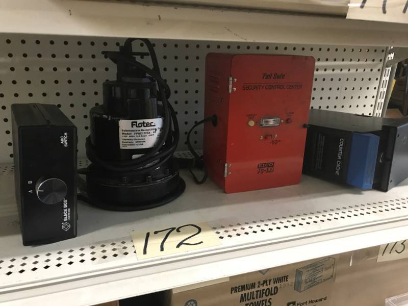 lot 172 image: Shelf of Misc - Counter Cache (Money Drop), Fail Safe Security Control Center, Sump Pump Flotec, Black Box