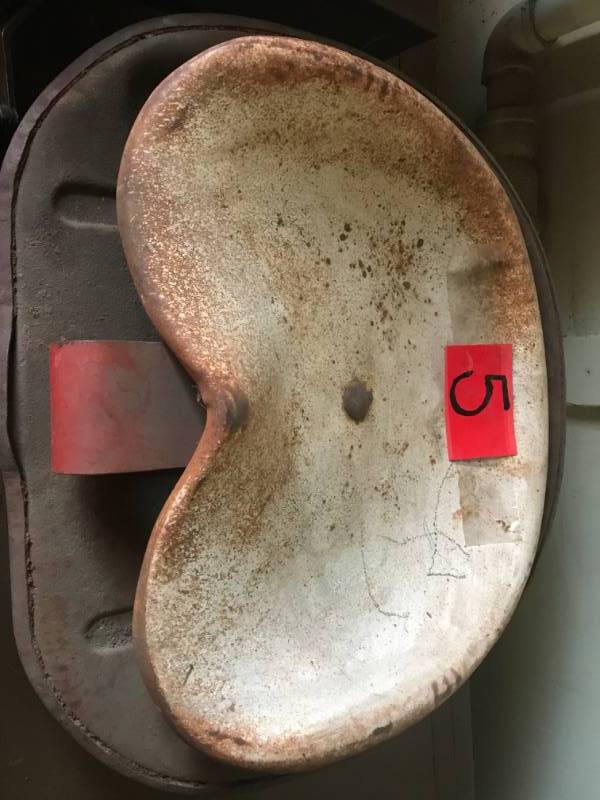 lot 5 image: Antique Tractor Seats (2)