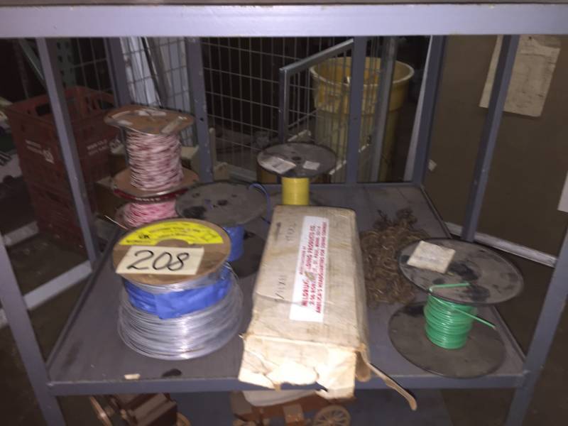 lot 208 image: Spools of Misc Wire 1-spool electric fence (900 apprx), 1-spool thermostat wire, 1-spool thermbell wire, 3-spools misc & other