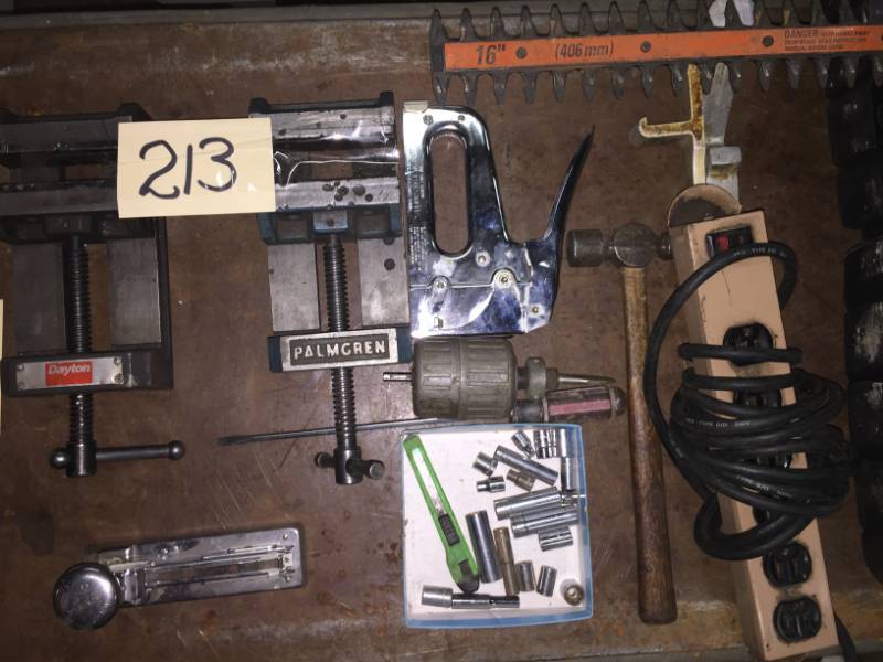 lot 213 image: Top Shelf 2- Vises DaytonPalmgren. Skilsaw 2.4 HP powers up, Hedge Trimmer Black & Decker powers up & etc