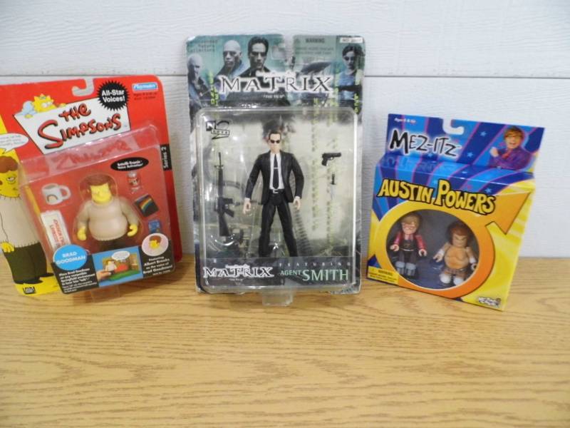 lot 56 image: Simpsons - Matrix - Austin Powers Figures
