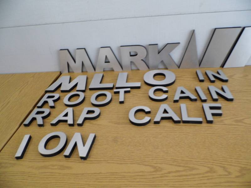 lot 100 image: Silver Letters