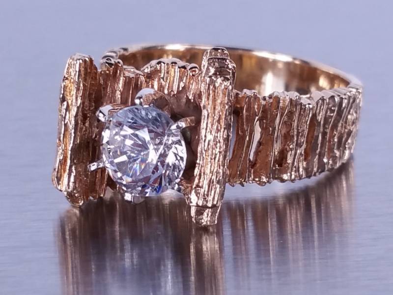 lot 83 image: Moissanite and Diamond Ring