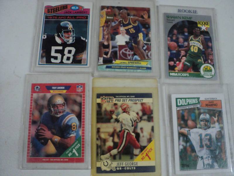 3 Football and 3 Basketball Cards...
