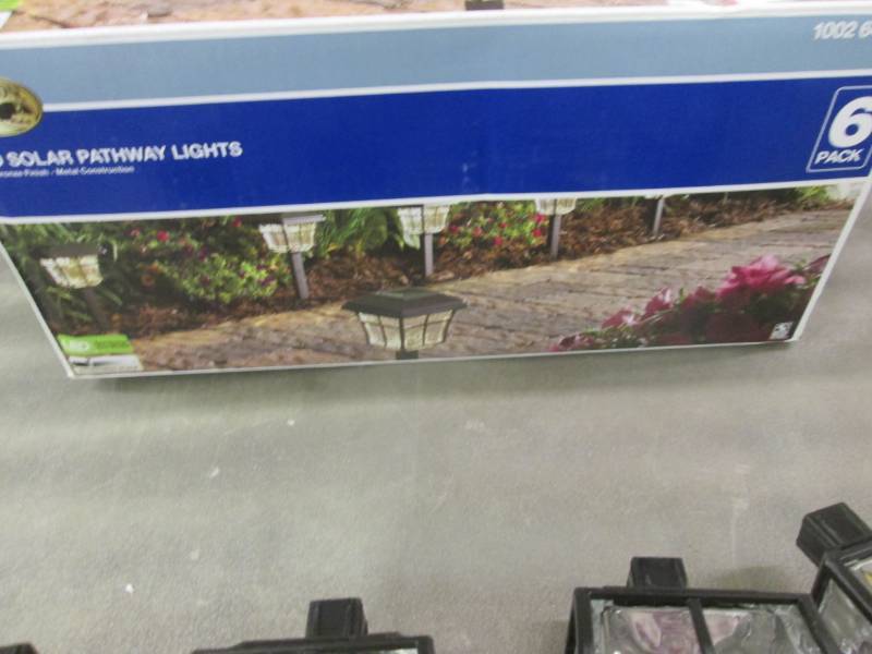 lot 24 image: Hampton Bay LED Solar Pathway Light...