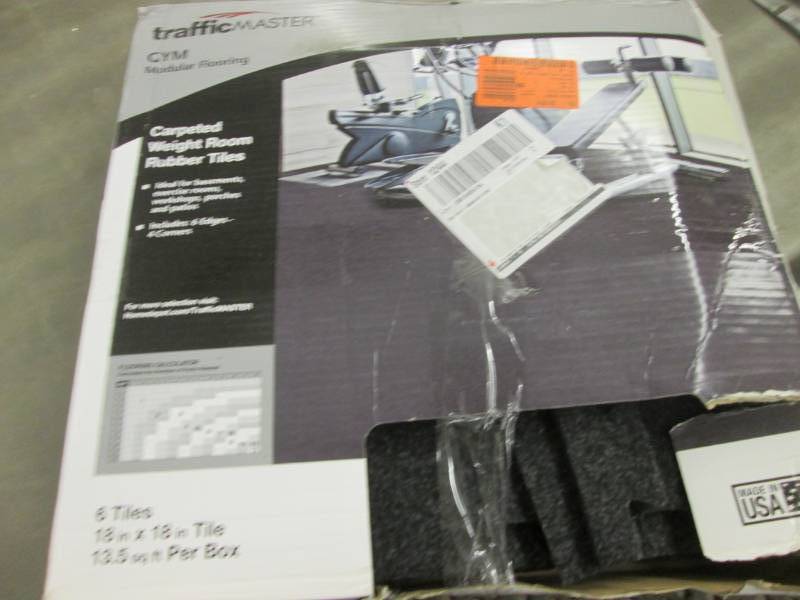 lot 202 image: TrafficMaster Ebony 37 in. x 54 in....