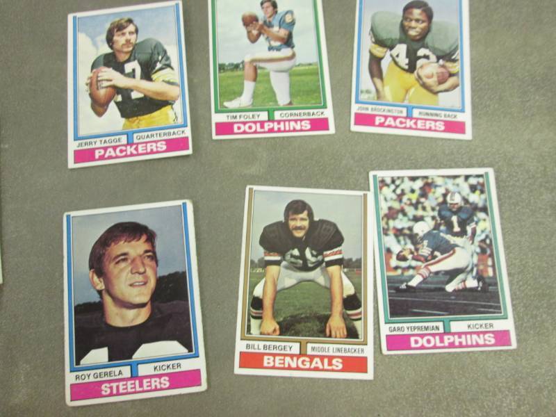 lot 327 image: 25 1974 Topps Footbal Cards...