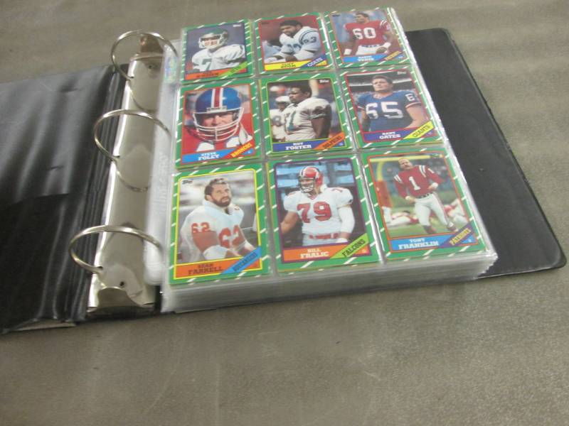lot 379 image: 1986 Topps Football Cards...