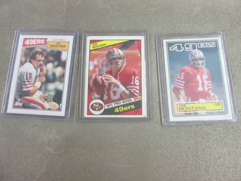 lot 412 image: 3 Joe Montana Cards...