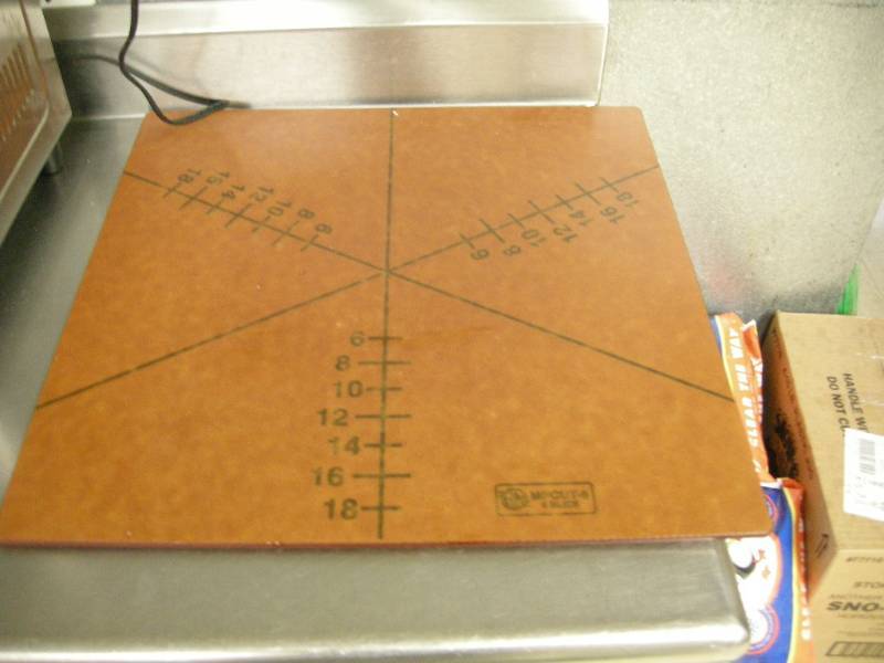 lot 64 image: MPCut-6 Pizza Cutting Board