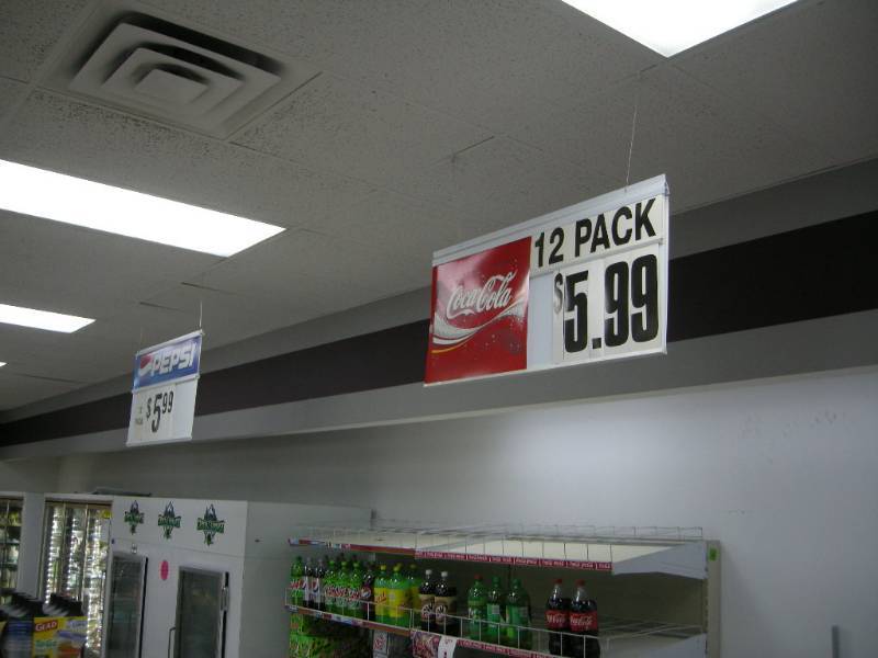 lot 37 image: 4 Hanging Pop Signs