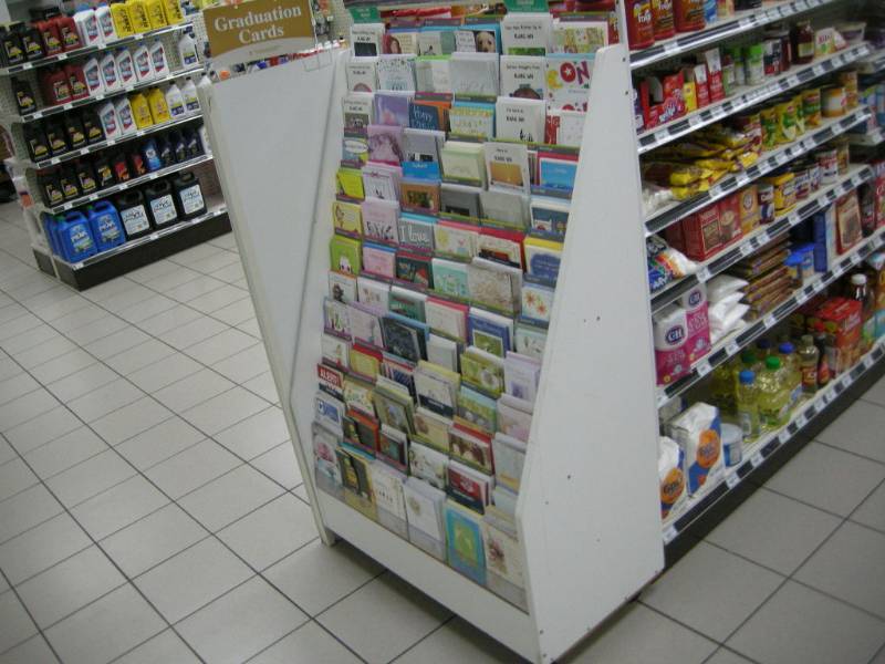lot 38 image: Greeting Card Center Rolling Display