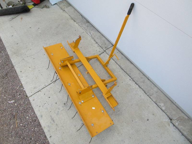 lot 13 image: De-Thatcher for Walker Mower