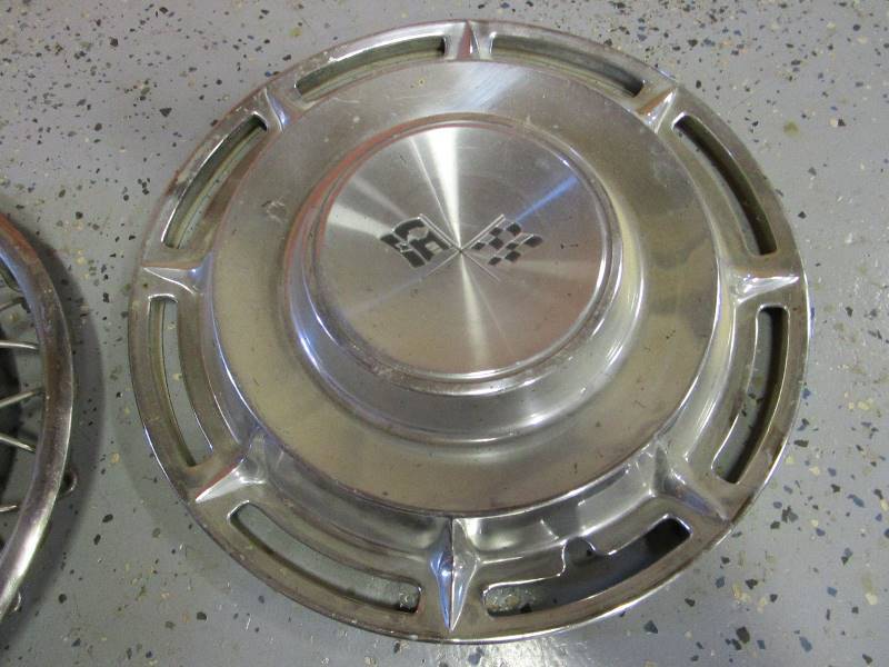 lot 44 image: (2) Corvette Hubcaps