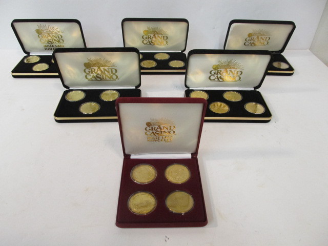 lot 25 image: Collection of Grand Casino Coins wCases