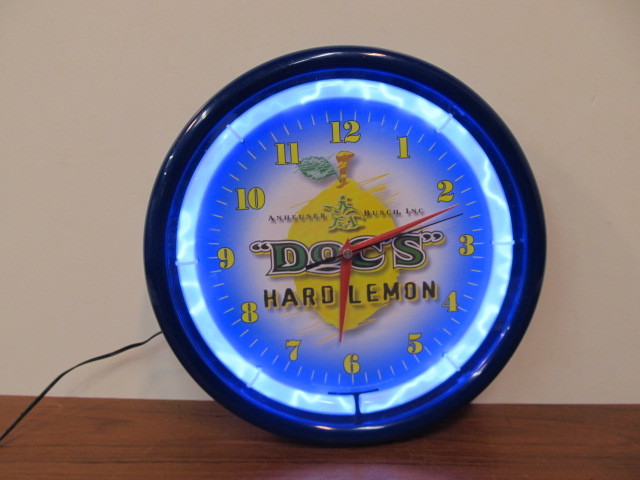 lot 111 image: Working Lighted DOCS Hard Lemon Advertising Clock