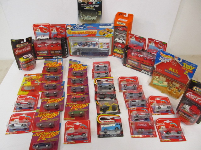 lot 146 image: Large Lot of Mint on Card Diecast Cars