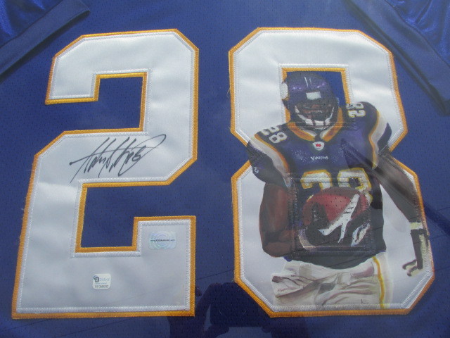 lot 69 image: Large Framed Authentic Hand Painted &  Autographed ADRIAN PETERSON Vikings Jersey