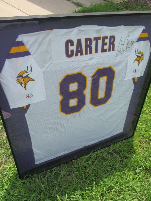 lot 70 image: Large Framed Authentic Autographed CHRIS CARTER Vikings Jersey