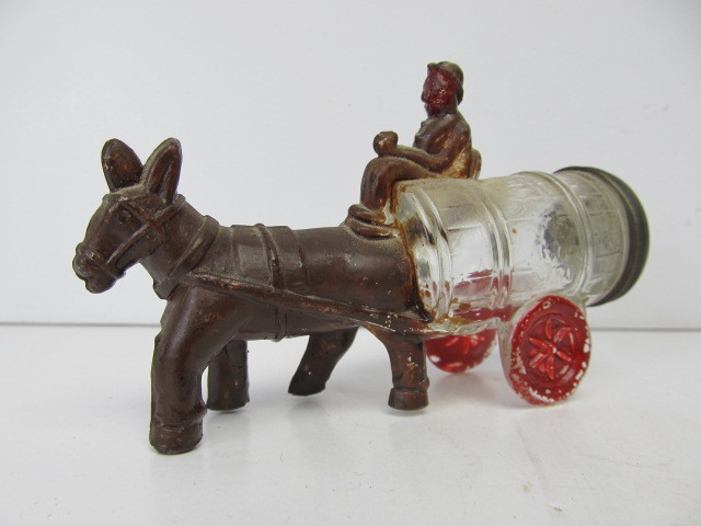 lot 209 image: Orig Antique Figural Donkey Pulling Barrel Glass Candy Container.
