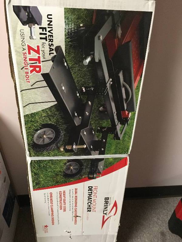lot 32 image: Brinly 48 in. Front Mount Dethatcher for ZTR Mowers not used