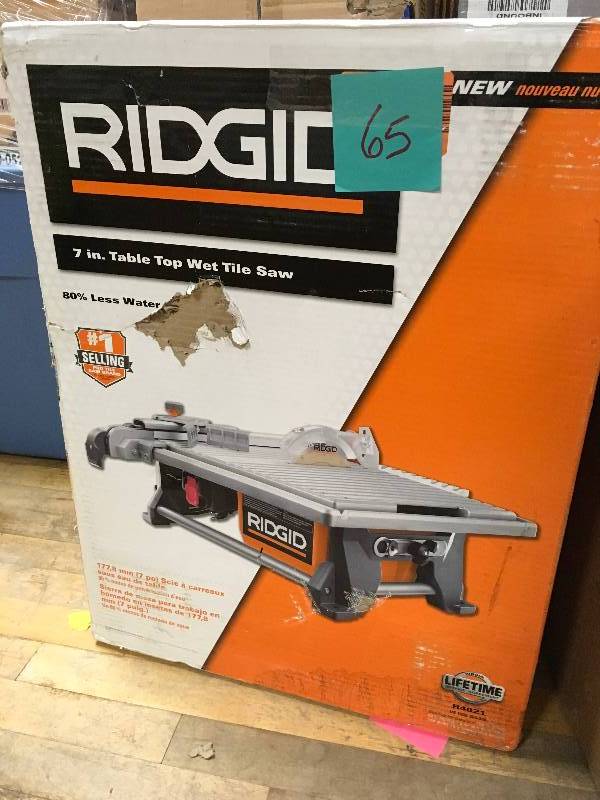 lot 65 image: Ridgid 7 in Table Top Wet Tile Saw in good condition