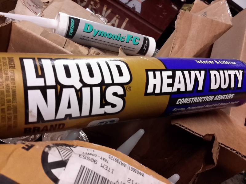 lot 168A image: Lot of misc. tubes of liquid nails and other
