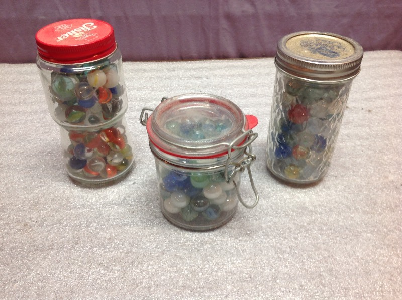 lot 24 image: 3 Jars Glass Marbles