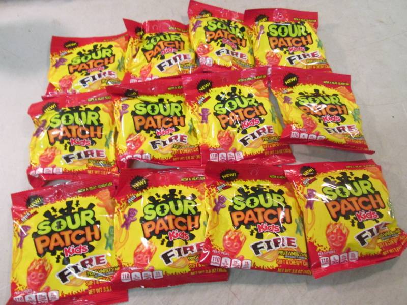 lot 53 image: Case of 12 Bags of Sour Patch Kids ...