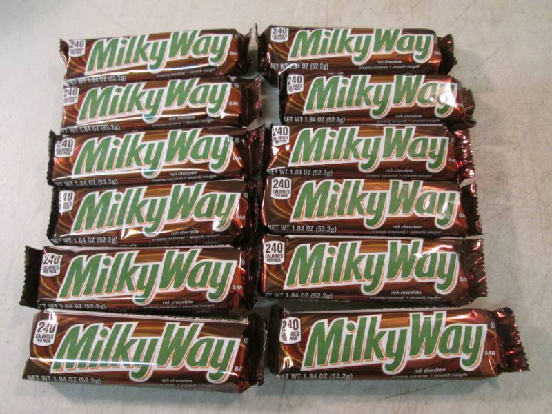 lot 59 image: 12 Milky Way Candy Bars Best by Apr...