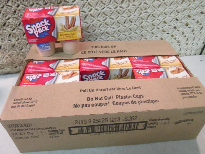 lot 86 image: Case of 12 4-Pack Cups of Cinnamon ...