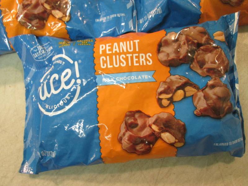 lot 131 image: 5 Bags of Milk Chocolate Peanut Clu...