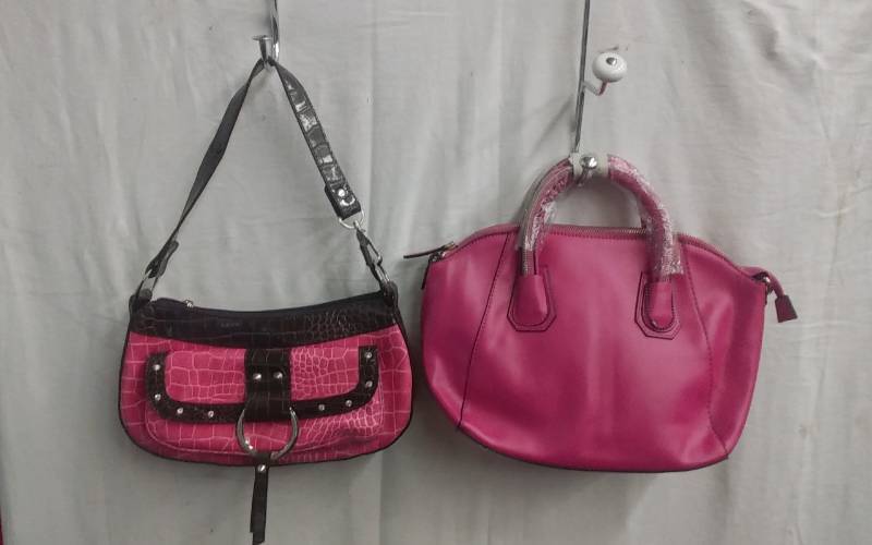 lot 14 image: 2-Bright Pink Hand Bags (1-New With Tags)
