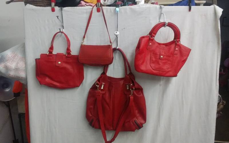 lot 19 image: 4-Red Hand Bags