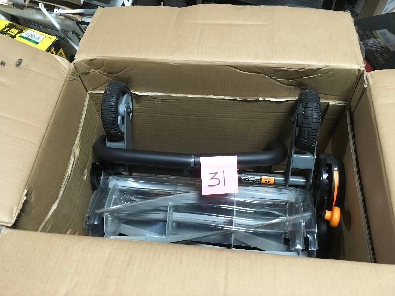 Fiskars 18in manual  lawmower used in good condition