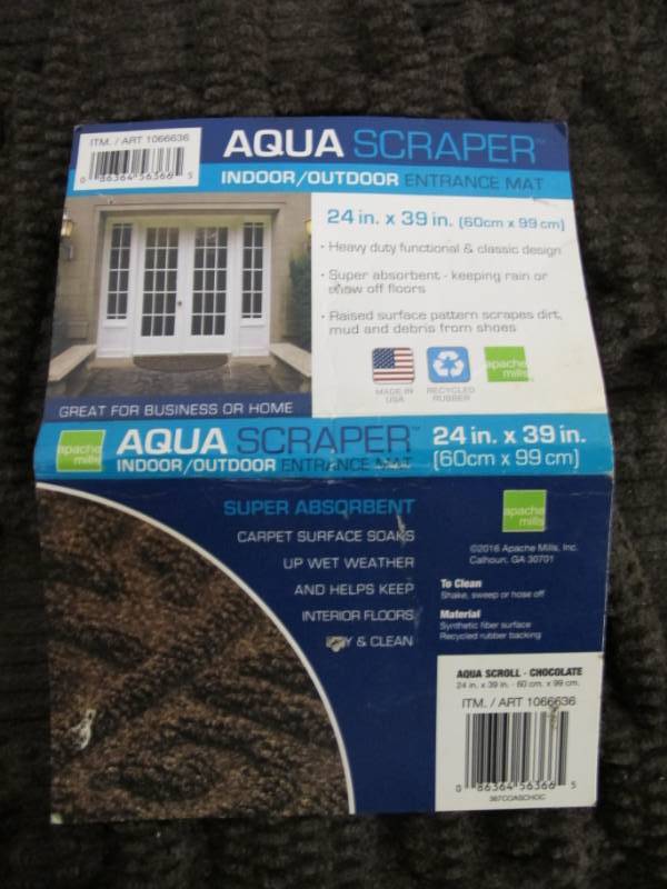 lot 28 image: Apache Mills Aqua Scraper Semi-Circle IndoorOutdoor Entrance Mat 24 in x 39 inch Aqua Scroll - Chocolate