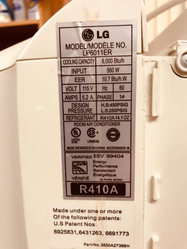 lot 73 image: LG  Air Conditioner  Remote Control  Window Unit