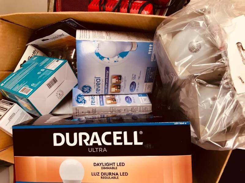 lot 94 image: Files  GE  Duracell   Light Bulbs  Battery Chargers, Etc.