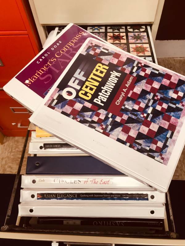lot 103 image: File Cabinet Drawer Full of Quilting, Knitting, Embroidery Patterns, Etc.