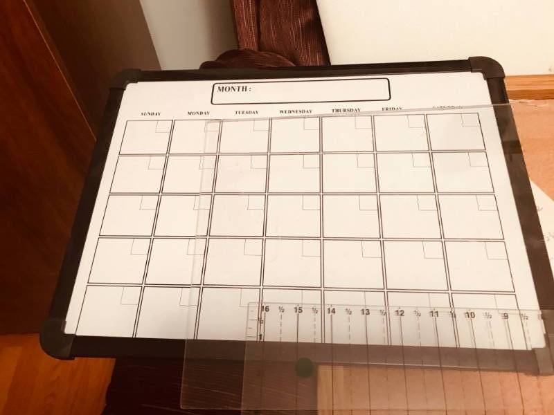 lot 110 image: Knitting  Sewing  Tools  Dry Erase Calendar  Bulletin Board, Etc.